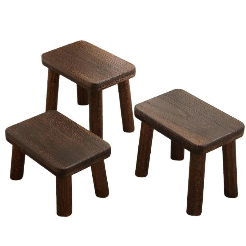 Distressed solid wood changing stool with bracket structure for hallway or living room.