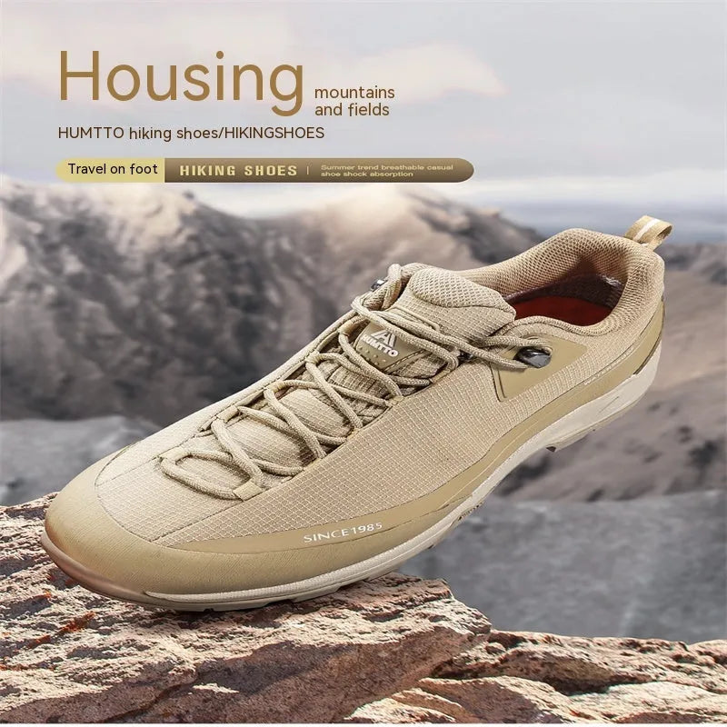 Men's low-top hiking boots with leather mesh upper and round toe design in black colour