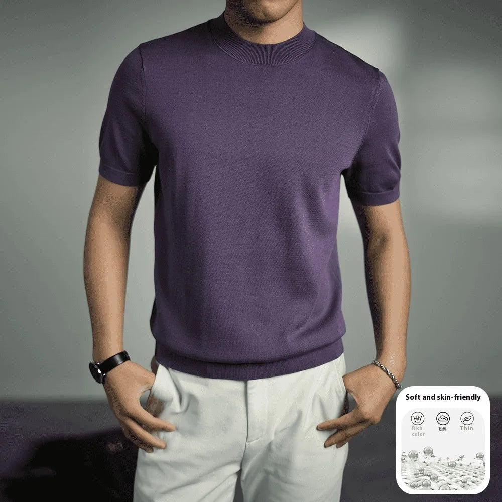 Man wearing a solid colour knitted business t-shirt with round neck and short sleeves.