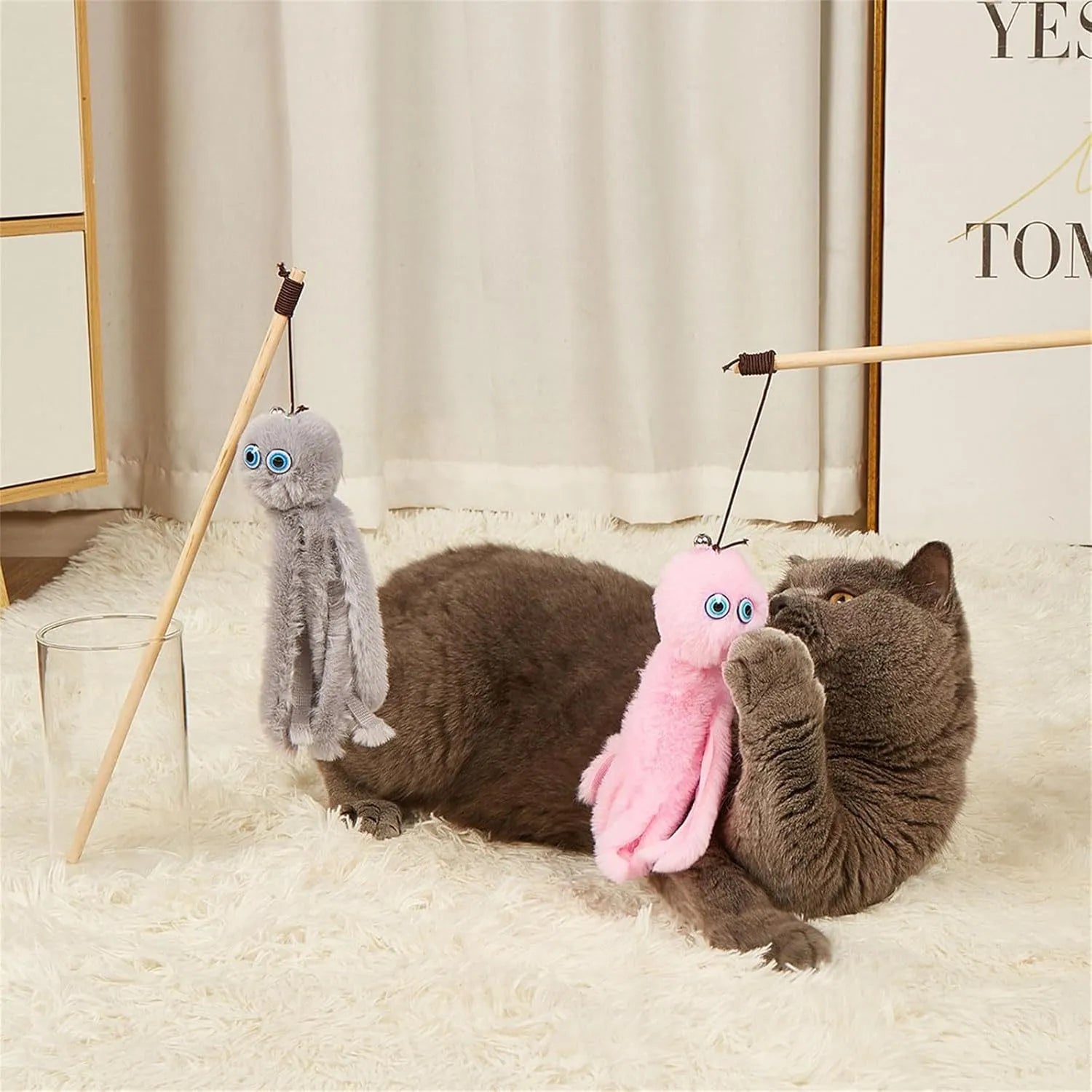 Grey octopus cat toy with eyes on long stick for indoor kitten play