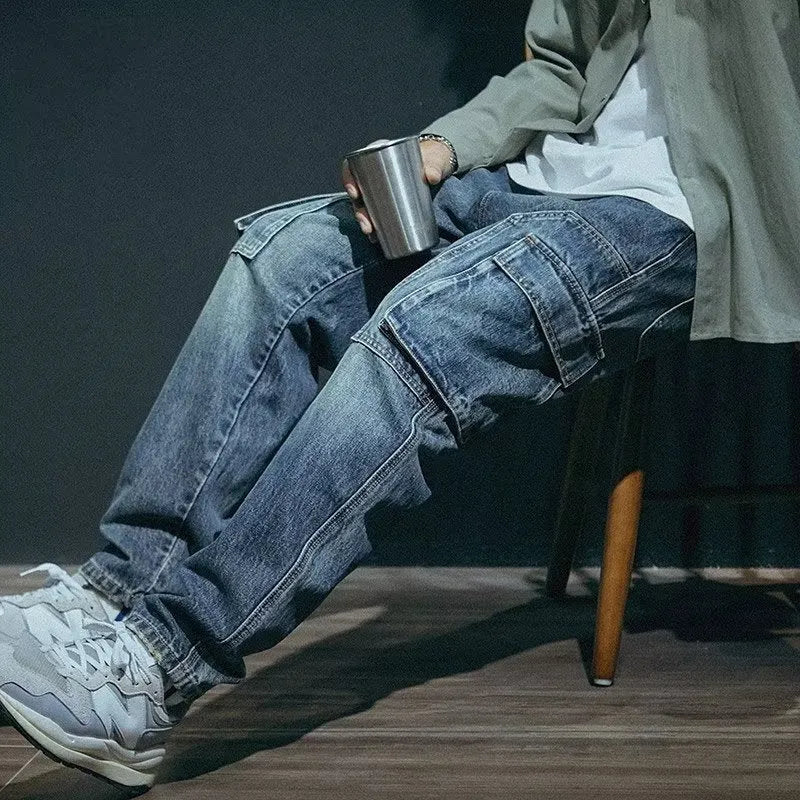 Blue men's loose fit straight-leg jeans with a zip fly on a mannequin