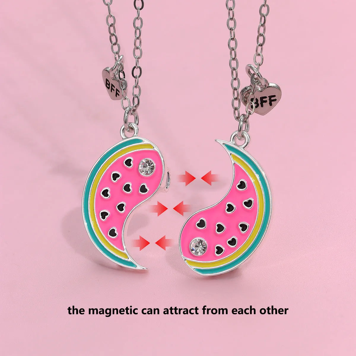 Two matching zinc alloy pendants in donut and watermelon shapes with glossy oil drip finish on cross chains