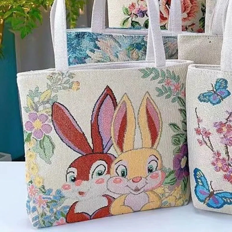Double-sided gold wire embroidered canvas bag in small, medium, or large size.