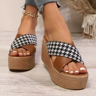 Cross leopard plaid wedge sandals in brown and black patterns with rubber sole and plastic upper