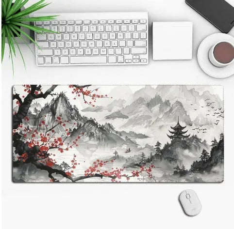 Large custom anime print gaming mouse pad on a desk with keyboard and mouse.