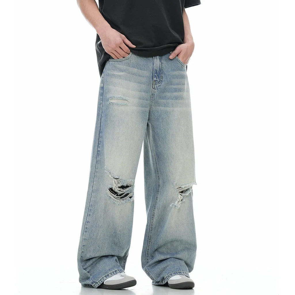 Men's blue straight-leg jeans with retro ripped detailing and an adjustable waistband