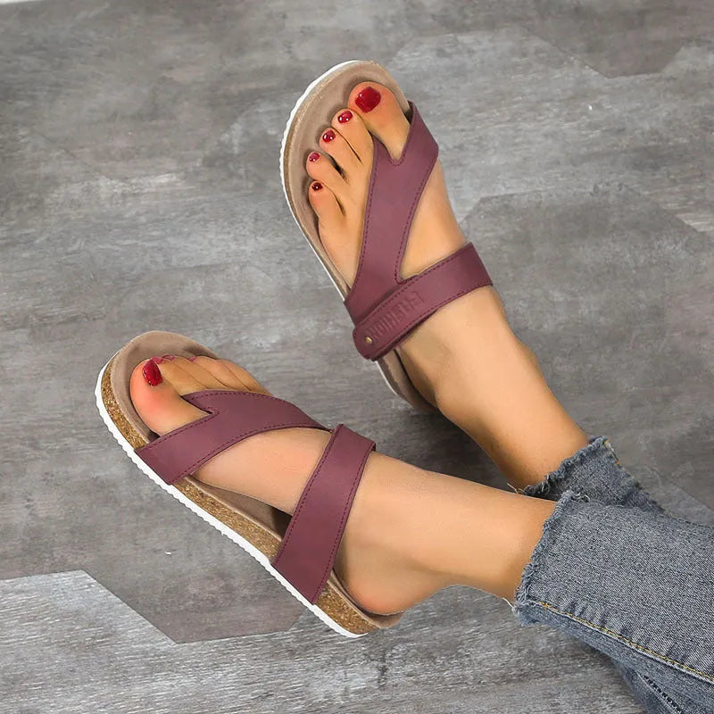 Flat toe ring flip-flops with a thick foam sole in a choice of solid colours on a white background.