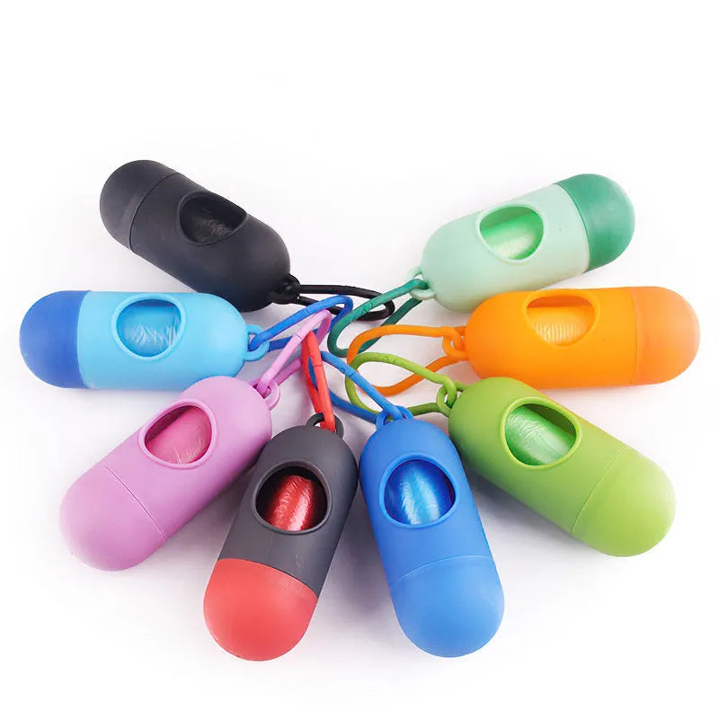 Compact dog poop bag holder with hook and Velcro strap attached to a leash handle, available in multiple colours