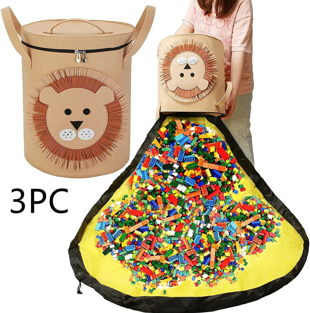Green felt cube storage bag with pull rope open as a floor play mat for toys.