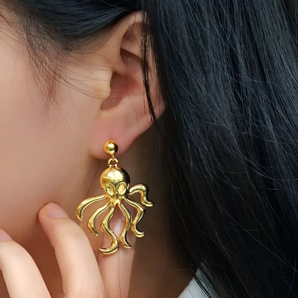 Gold stainless steel drop dangle octopus earrings with minimalist retro design