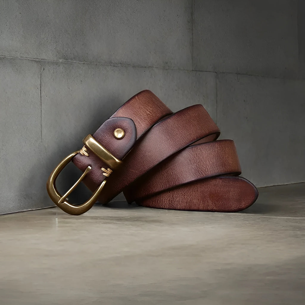 Men's casual jeans belt in black first layer cattlehide leather with a copper pin buckle.