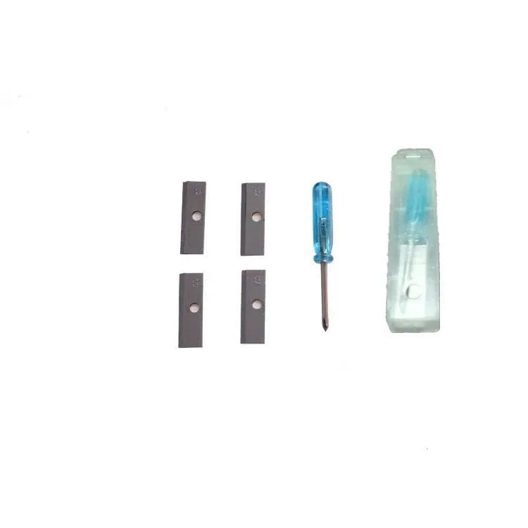 Geometric-shaped plastic pencil sharpener with four holes and a small screwdriver.