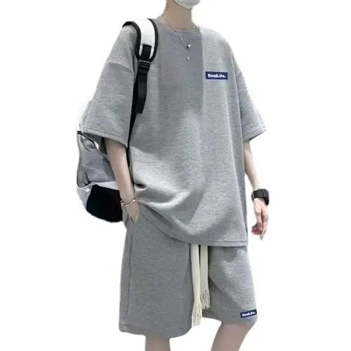 Men's waffle-textured leisure sports suit set with short sleeve top and matching shorts in cotton polyester blend fabric