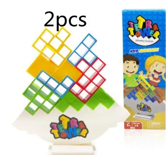 Balance stacking game with 16 plastic building blocks, chassis, and base on a table