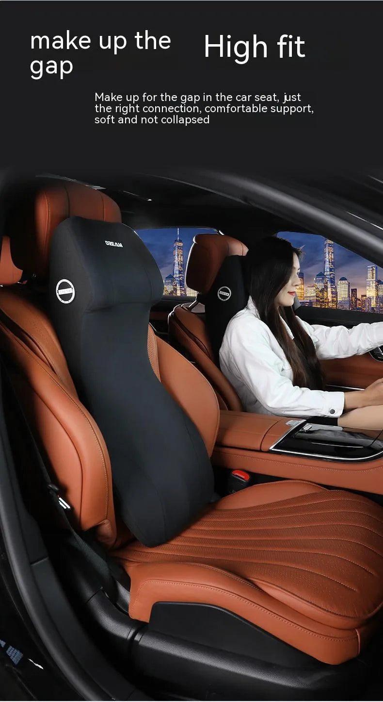 Black automotive memory foam waist cushion and headrest lumbar support pillow on a car seat.
