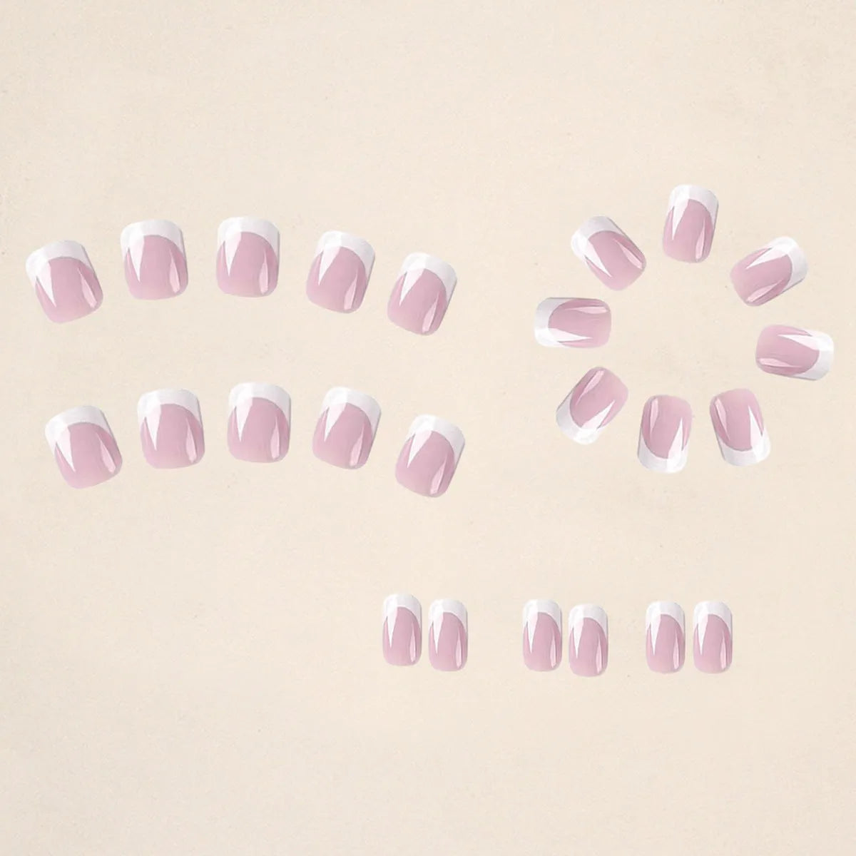24 white fake nails with plaid patterns arranged as nail tips