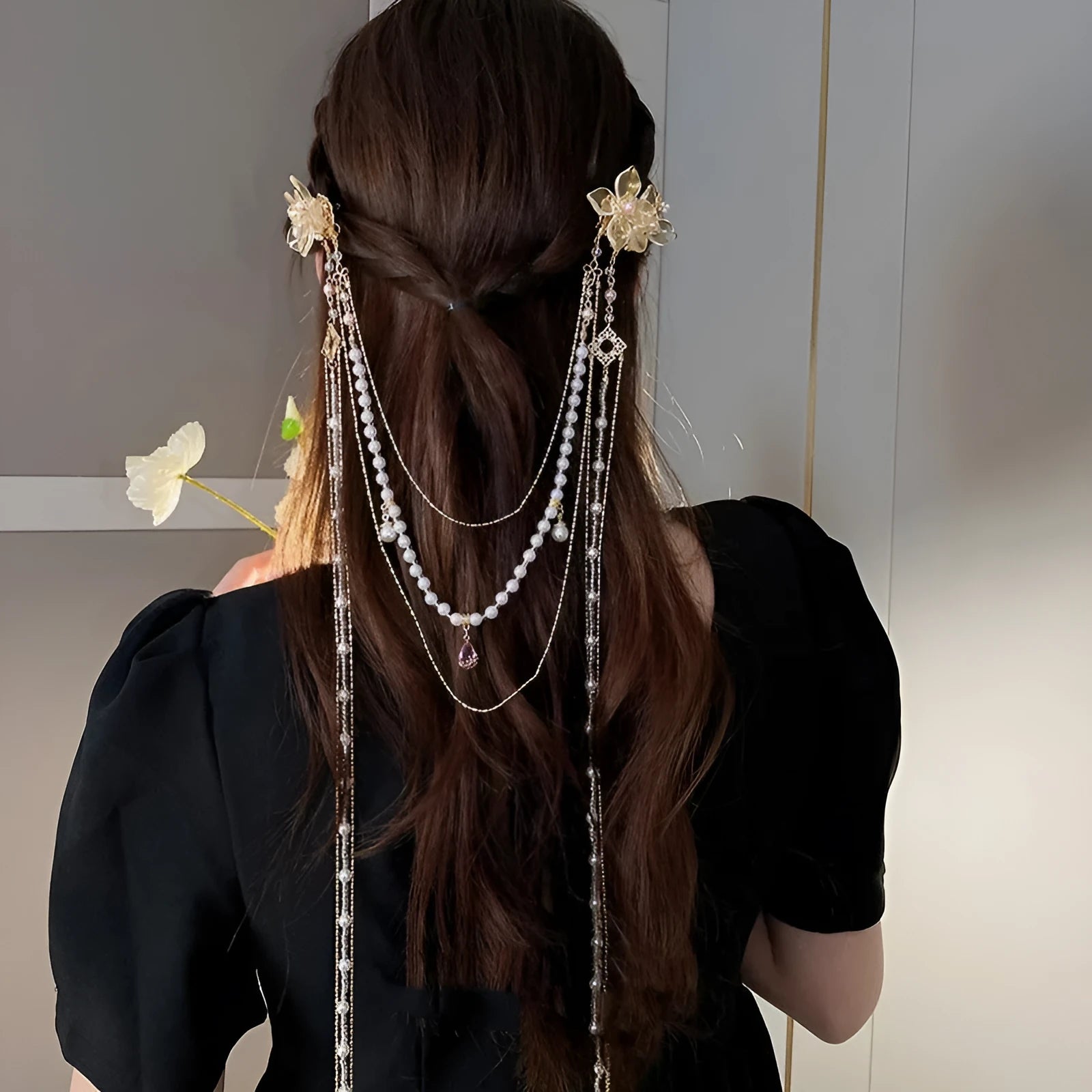 Gold grip hairpin with white pearl, clear diamond, flower decoration, and a long beaded tassel.