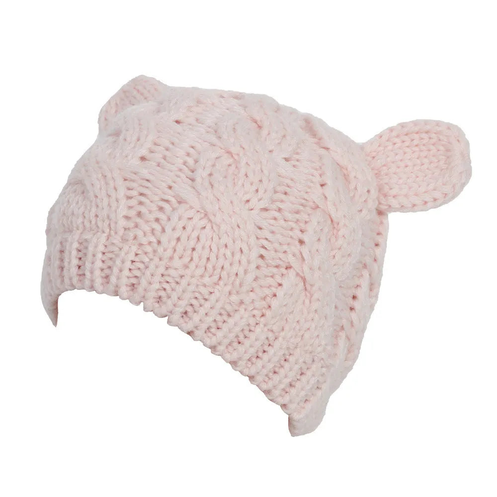 Hand knitted wool cat ear beanie in red colour for winter wear