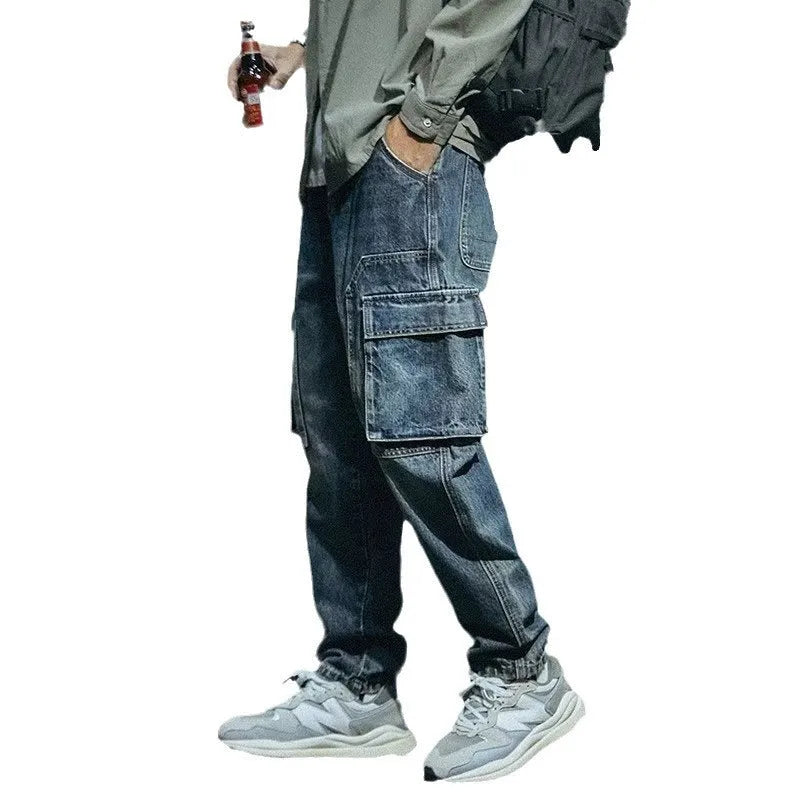 Blue men's loose fit straight-leg jeans with a zip fly on a mannequin