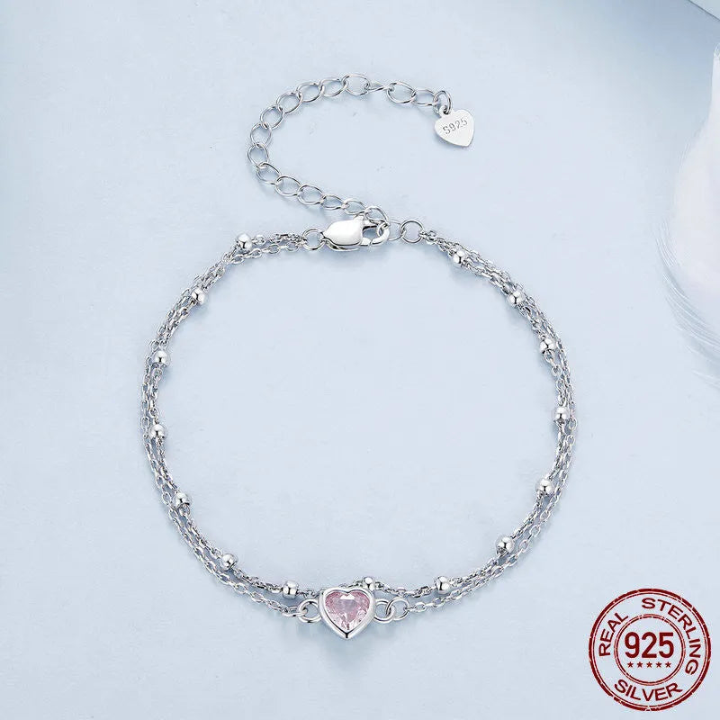 Sweet girlish style 925 sterling silver bracelet with a small heart pendant on an adjustable chain.