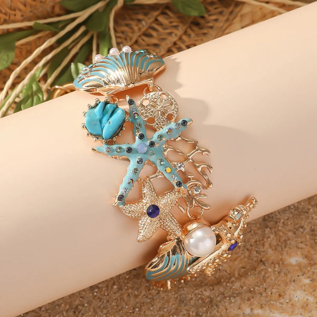Women's alloy rhinestone marine bracelet with boat anchor and shell design in coastal colours