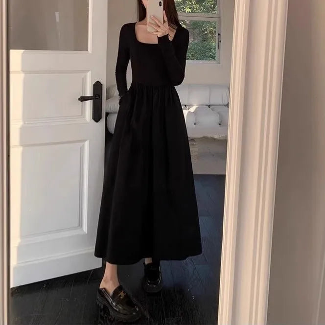 Women's black knitted dress with square collar, long sleeves, elastic waist, and A-line long skirt