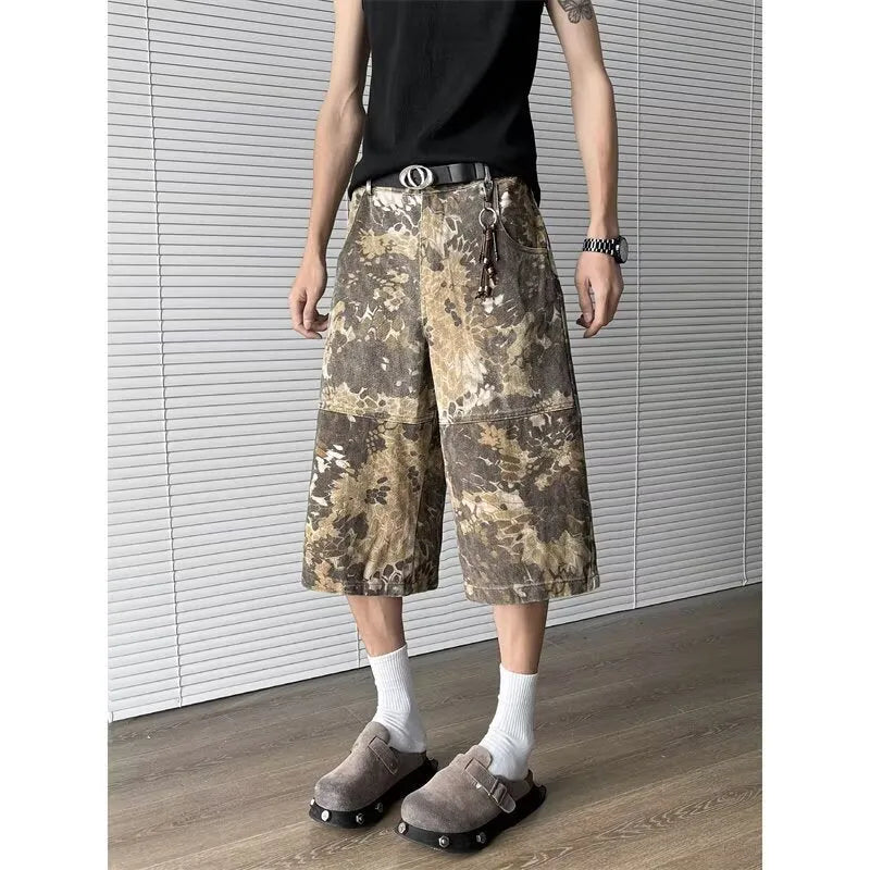 Yellow snake pattern camouflage cropped jeans with cotton denim construction showing tooling detailing