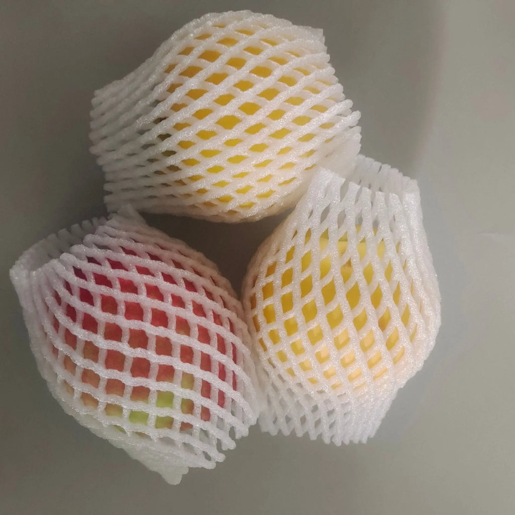 White foam net cover for fruit protection shown in various sizes on a table.