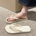 Men's PVC flip flops with toe cover design in multiple colour options showing injection moulded construction