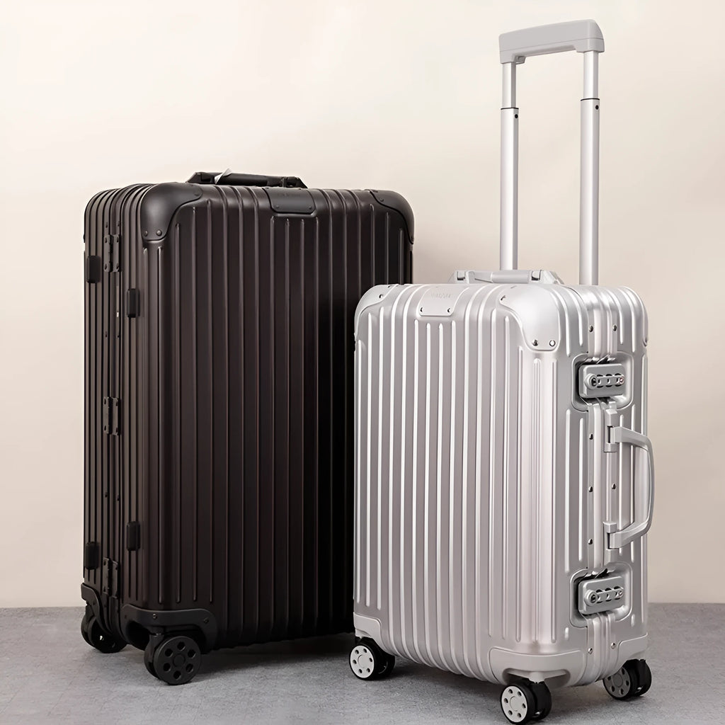 Alloy trolley case luggage in silver colour with metal frame and universal wheels for business travel