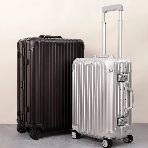 Alloy trolley case luggage in silver colour with metal frame and universal wheels for business travel