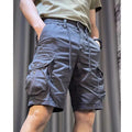 Loose straight casual overalls pants in black colour with multiple pockets and elastic waistband.