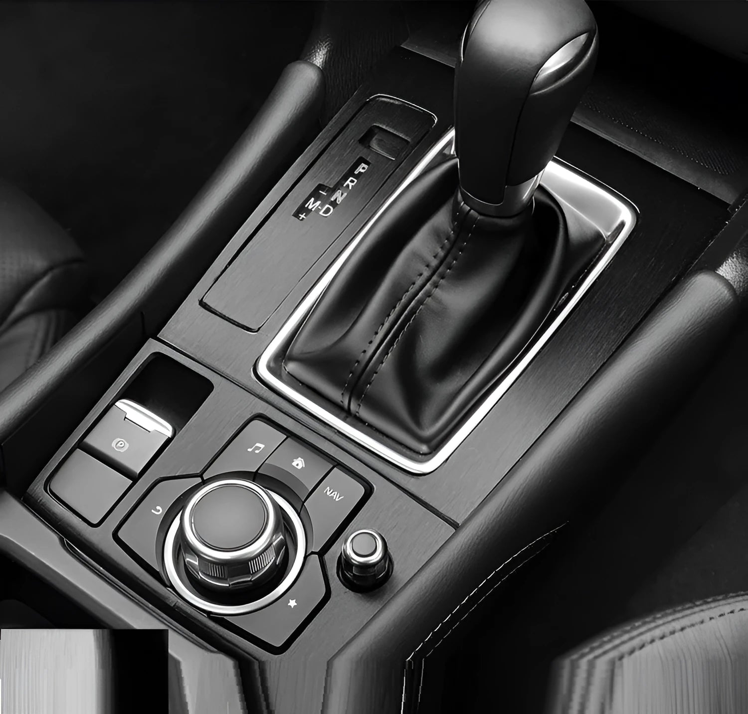 Car interior decorative film sticker kit showing carbon fibre pattern applied to centre console and dashboard