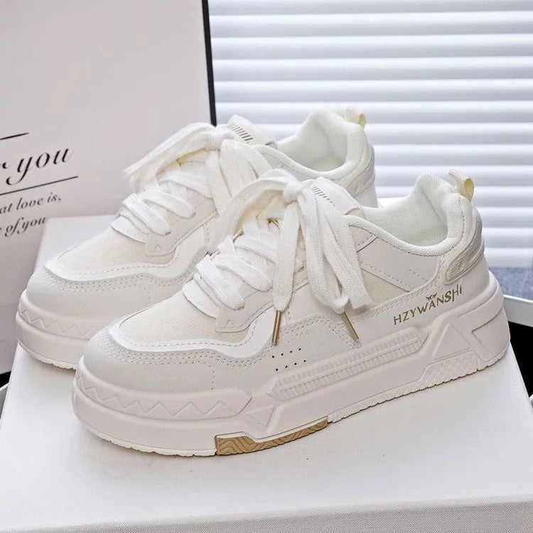 Children's height-increasing shoes with thick rubber soles, cross shoulder straps, and synthetic leather uppers in beige