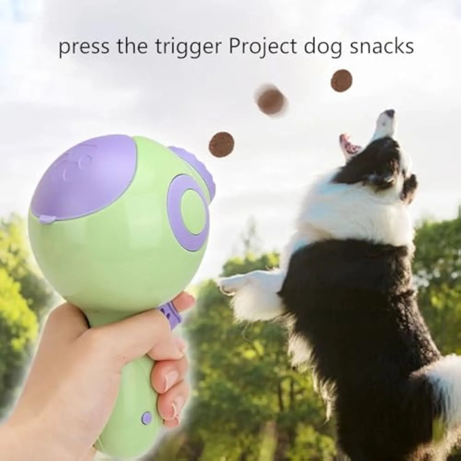 Green pet treat launchers toy showing treat dispensing mechanism and remote feeding function