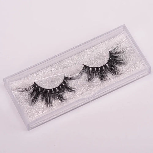 5D mink false eyelashes set with brush and hair cap on black background