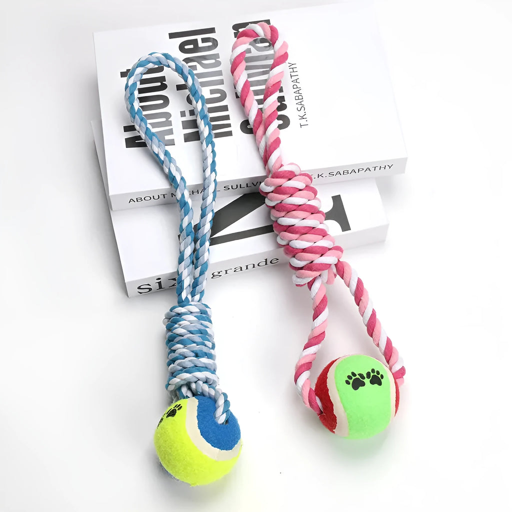 Red and white cotton rope tug toy for dogs, approximately 38cm long, laid out straight.