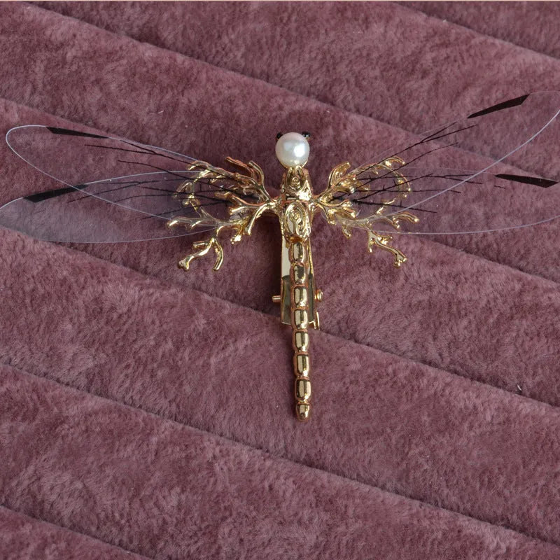 Gold dragonfly side clip headdress with detailed alloy construction and electroplated finish