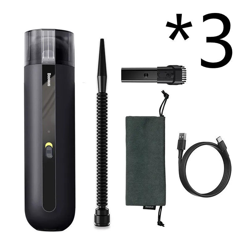 Starry Sky Black wireless handheld car vacuum cleaner with blowing hose on a car seat