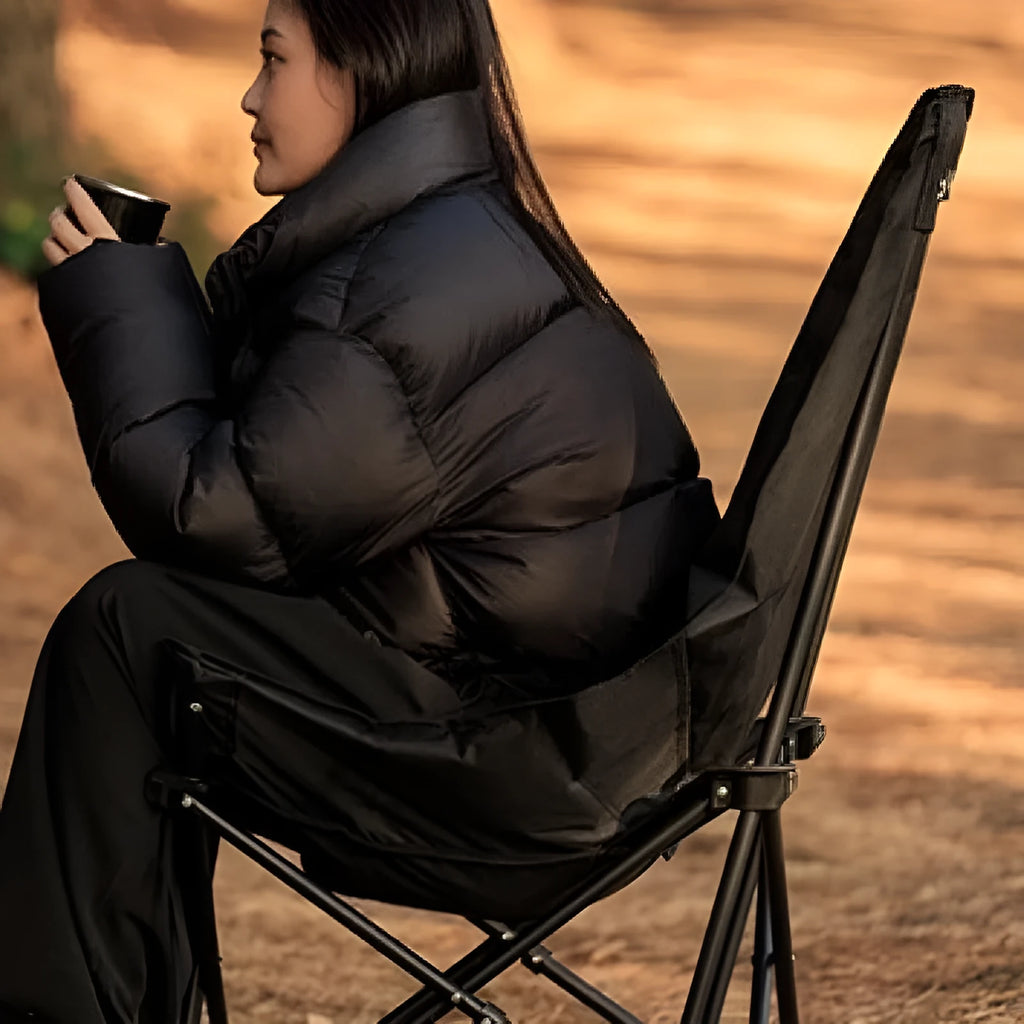 Night black Oxford cloth camping moon chair in folded and unfolded positions