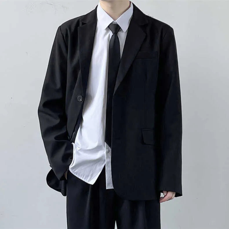 Men's plus size college style suit set in grey, featuring a blazer, trousers, white shirt, and tie.