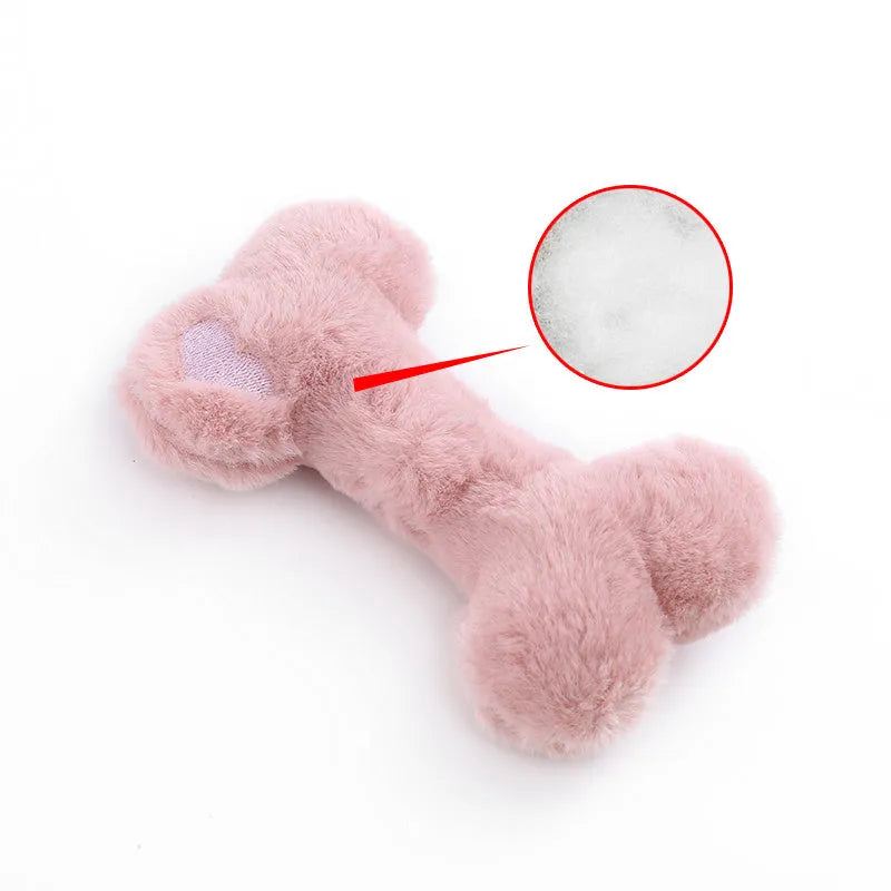 Plush bone-shaped dog toy in blue, pink or yellow with a squeaker for interactive chewing play.