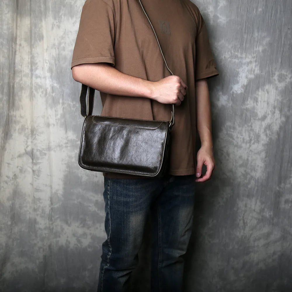 Men's genuine leather crossbody shoulder bag handmade patchwork in olive green colour on model