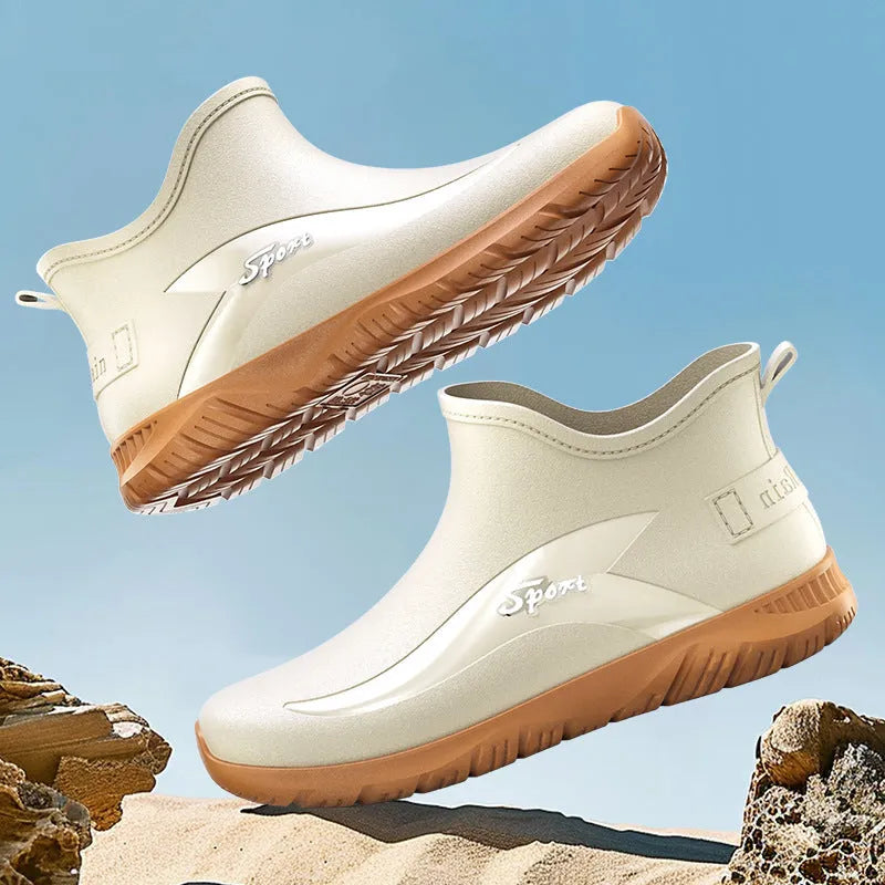 Men's short PVC rubber boots in beige, black and black-red colours with non-slip soles and flat heel