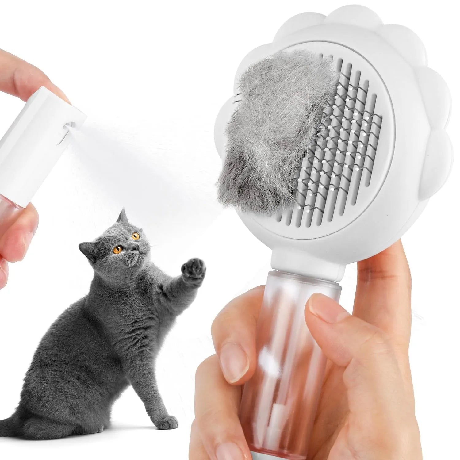 Grey spray cat grooming brush with release button and stainless steel bristles on a white background
