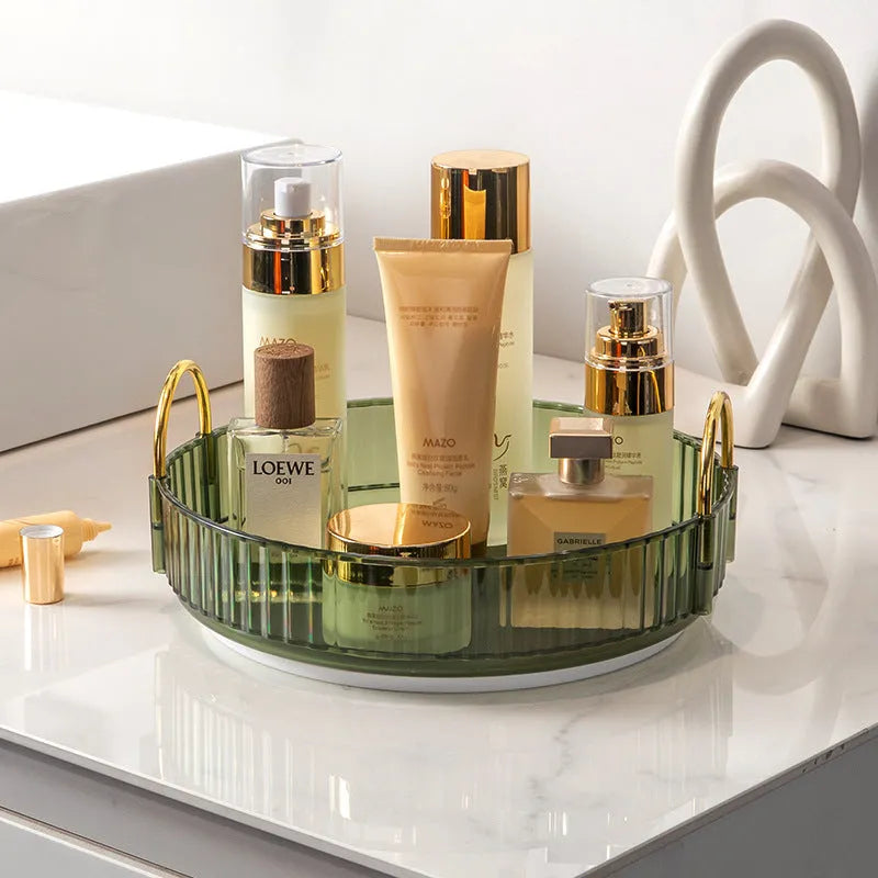 Three-layer rotating bathroom cosmetics storage rack in green, yellow, and white on a desktop