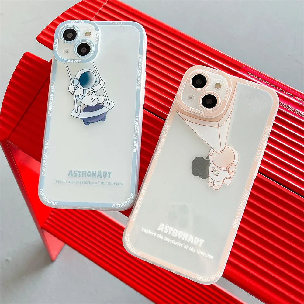 Transparent iPhone case with blue astronaut print showing phone through clear silicone and TPU material