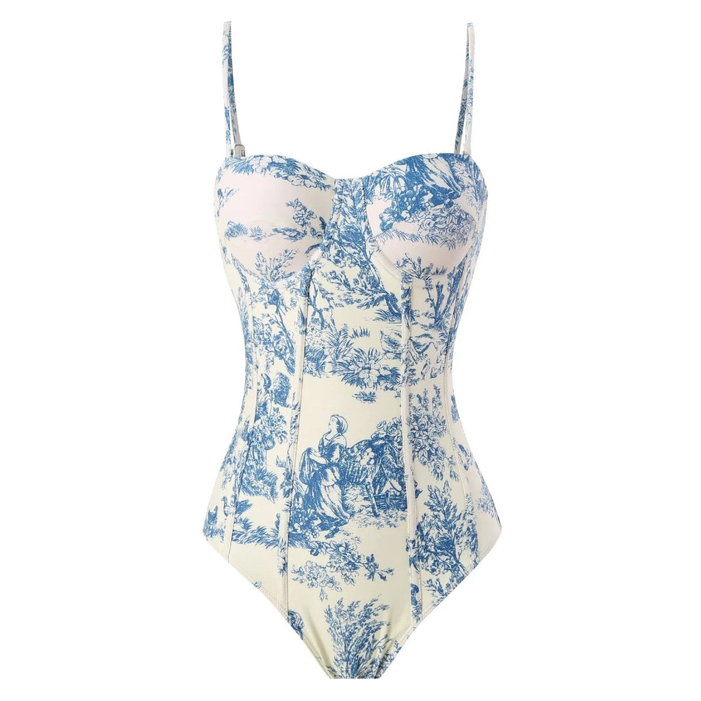 Women's blue one-piece swimsuit set with matching gauze skirt and separate swimsuit piece on size chart