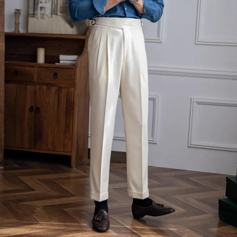 Man wearing high waist straight leg casual trousers in black polyester fabric.