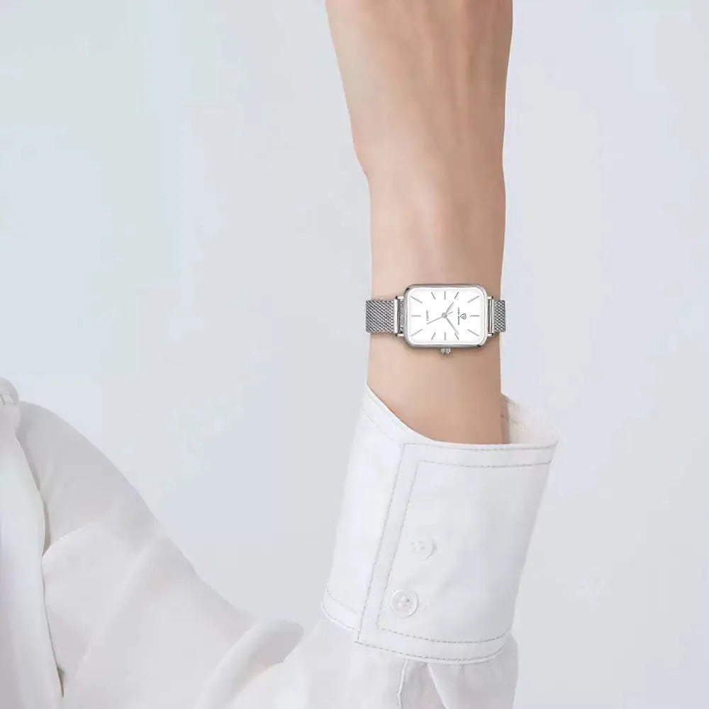 Women's rose gold or silver alloy waterproof quartz watch with woven steel strap.